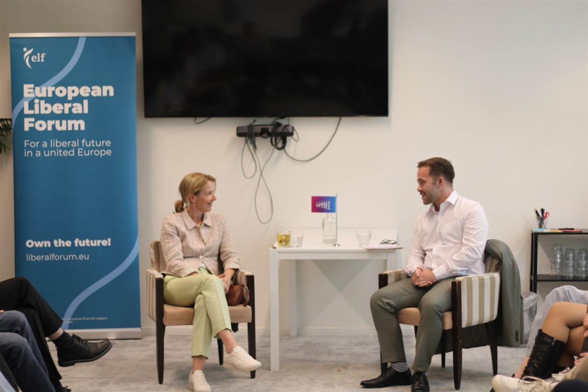 Tommy in conversation with a minister at a European youth event